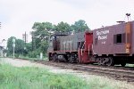 Southern Pacific MP15AC #2755 approaches a RR crossing.